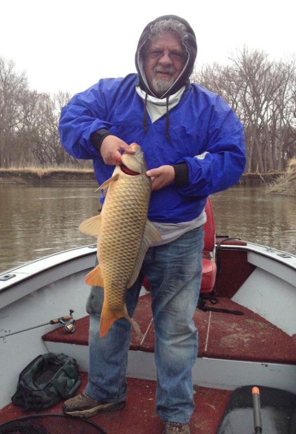 With one of the larger carp that we returned to the water.